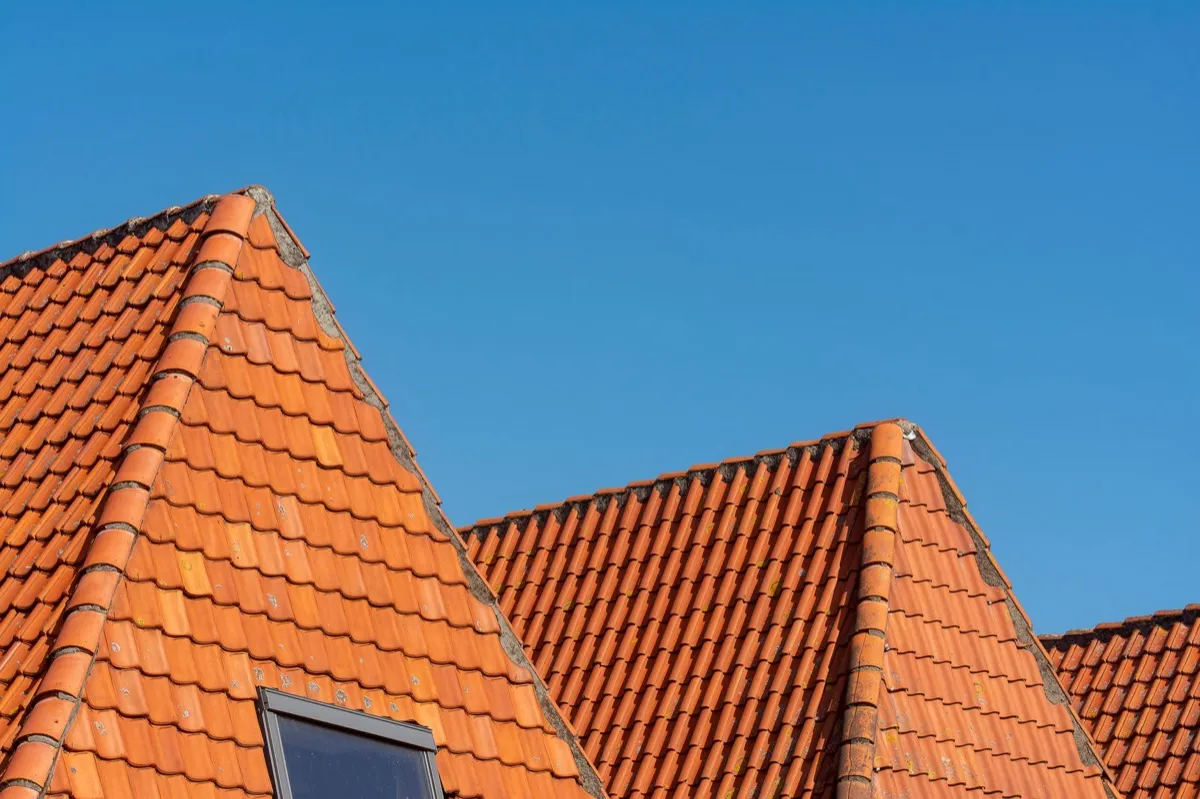 Clay barrel tile rooflines on homes in Columbia, MD